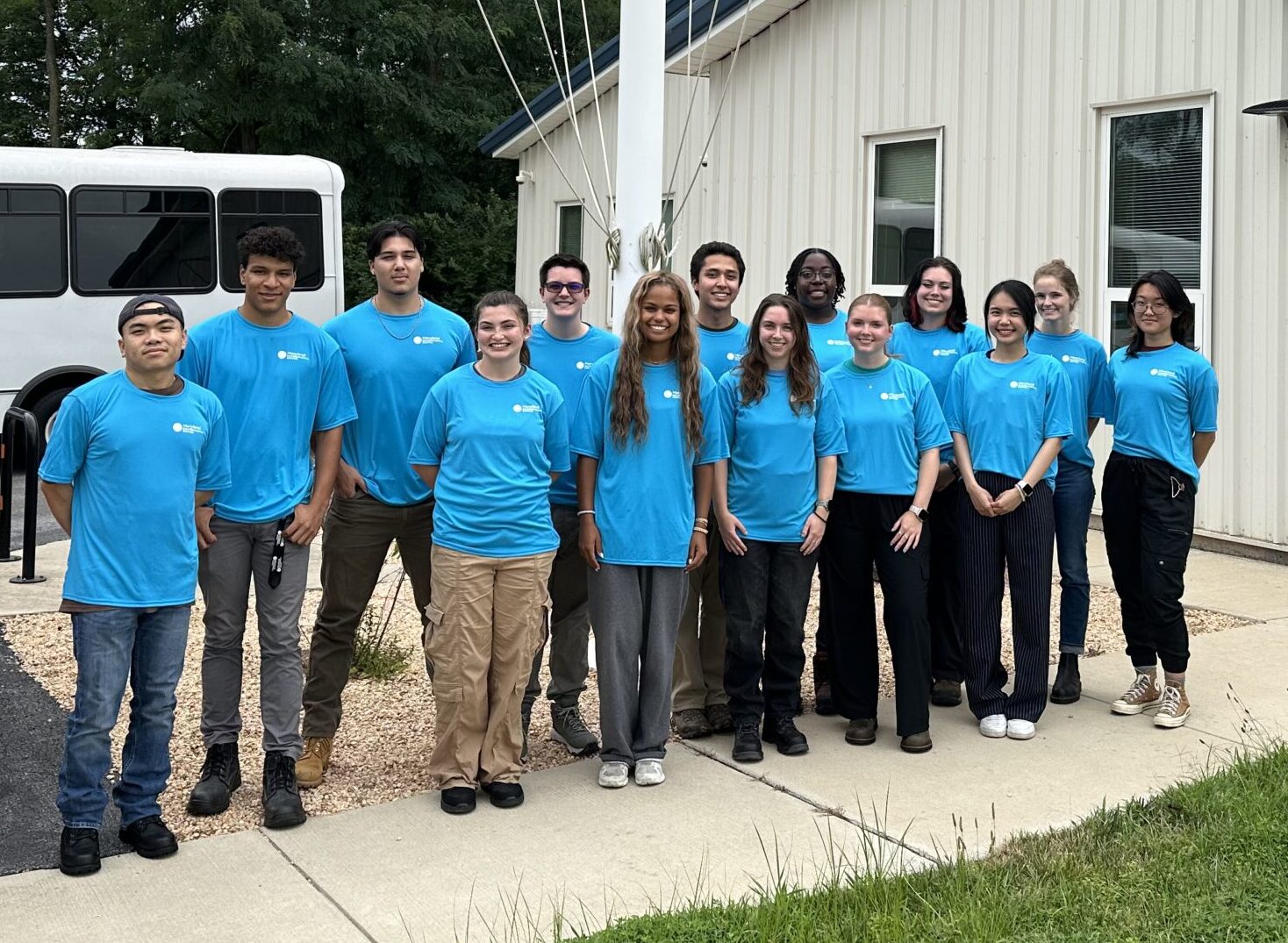 Group of MES Summer Intern Participants standing in front of the administrative building at Cox Creek Dredged Material Containment Facility.